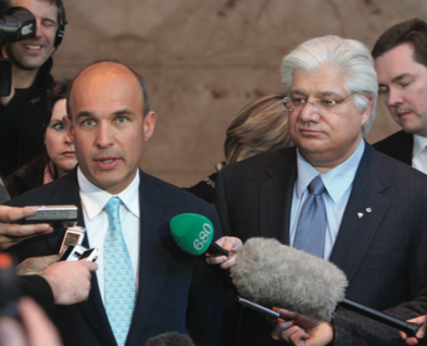Research In Motion co-CEOs Jim Balsillie (left) and Mike Lazaridis talk to the media after an Ontario Securities Commission hearing in Toronto on Feb. 5, 2009.